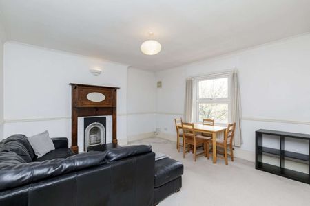 Attractive period conversion property with charm and character located on a popular, tree-lined street. - Photo 4