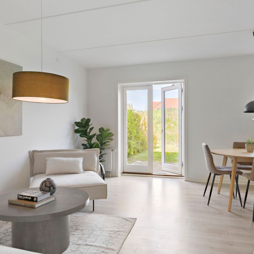 Dejligt rækkehus i Holluf Pile med have og gratis parkering - Photo 1