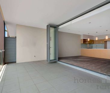 THIS SPACIOUS APARTMENT IS A MUST TO VIEW !!! - Photo 2