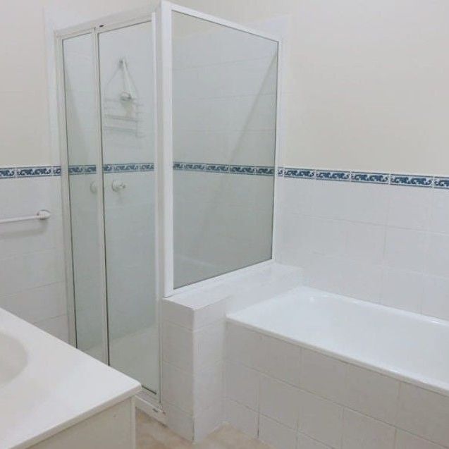 Spacious 3-Bedroom Home with Modern Amenities - Photo 1