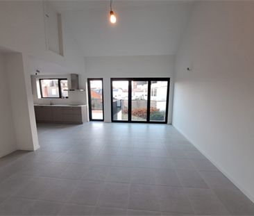 Een nieuwbouw appartement op de eerste verdieping met terras - Photo 3