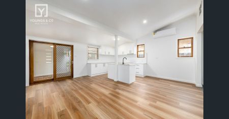 CENTRAL AND CHARMING - Photo 5