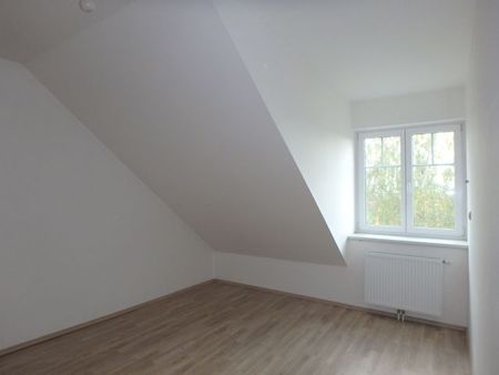 DACHGESCHOSSWOHNUNG MIT GEMEINSCHAFTSGARTEN IN AUSGEZEICHNETER WOHNLAGE - Photo 5