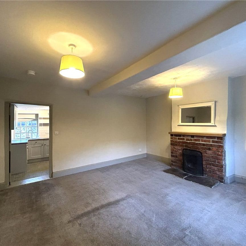 Available November, 6 Long Row is a lovely two bedroomed character cottage situated in the desirable village of West Tanfield and only a short distance away from the popular market towns of Masham, Ripon and Bedale. - Photo 1