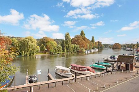 Situated with stunning views over the river Thames, this spacious apartment is perfectly located for access to the River, the town centre and the station. - Photo 5