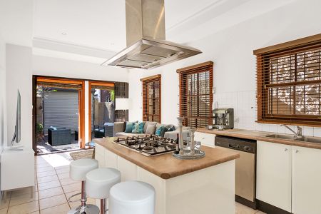 This 2 bedroom terrace is situated in a fantastic location. - Photo 2