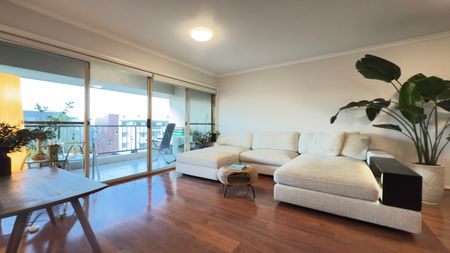 Top-Floor Serenity with Balcony Charm! - Photo 3
