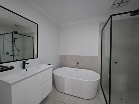 Brand New 3-Bedroom Duplex in Sought-After Taree Estate - Photo 5