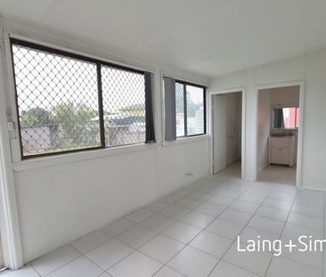 Inconspicuously Spacious home so close to everything. - Photo 2