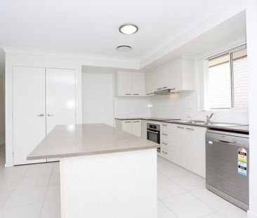 4 Bedroom Contemporary Home with Ducted Air Con - Photo 5