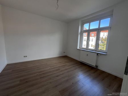 Urbanes Wohnvergnügen: Geschmackvoll renovierte 3-Zimmer-Wohnung mit Balkon! - Foto 5