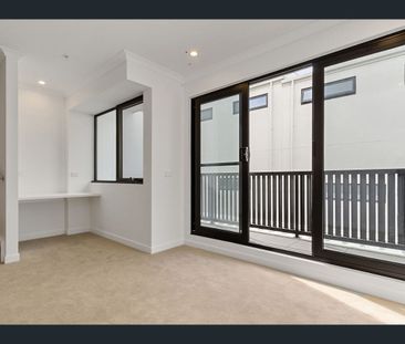 Stylish Three-Storey Living with Modern Comforts - Photo 2