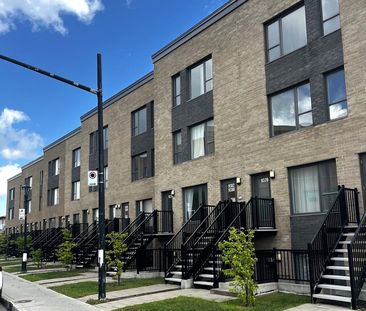 CONDO 3 1-2 + GRAND BALCON+STATIONNEMENT - Photo 2