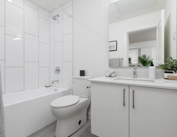 Maple View Heights Apartments — 2 Bed + Den - Photo 1