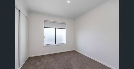 **RECEIVE ONE MONTH FREE RENT, ASK US HOW! Modern 4-Bedroom Townhome for Lease in Cloverton Estate - Photo 2