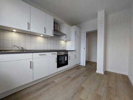 Lichtdurchflutete Dachgeschosswohnung mit Heidensee-Blick und neuer Einbauküche in 19055 Schwerin - Photo 4