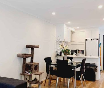 Stylish 2-Bedroom Home with Modern Comforts & Private Outdoor Spaces - Photo 5
