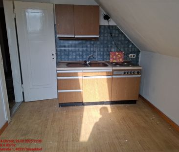 Helle Dachgeschosswohnung - Foto 1