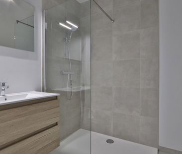 Nieuwbouwappartement met 1 slpk en autostaanplaats nabij centrum Be... - Photo 1