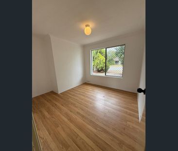 Large backyard with a shed - Photo 2