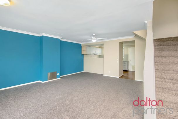 Three Bedroom Townhouse in Perfect Location! - Photo 1