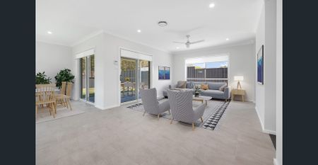 Brand-New 5-Bedroom Family Home in Peaceful Minmi - Photo 2