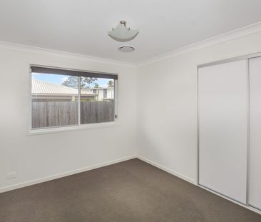 Spacious Family Home with Ducted Air & Entertaining Deck - Photo 1