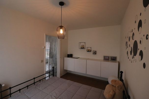 Een rustig gelegen appartement met kelderberging en autostaanplaats - Foto 1