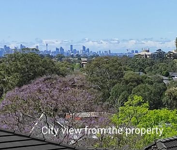 Quiet Secure Tri-level Townhouse with Distant City View & Internal ... - Photo 6