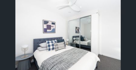 Fully Furnished East End Apartment | 2 Bed 2 Bath 1 Car | City Views - Photo 4