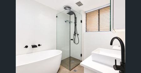 Boutique Coastal Retreat with Designer Interiors & Parking - Photo 4