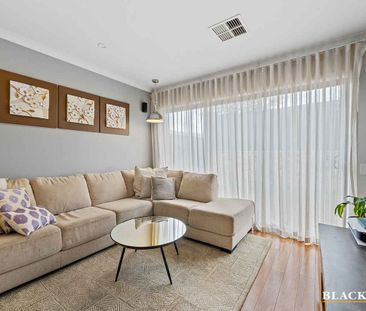 Welcoming Family Home with Open Living Spaces and Home Office - Photo 4