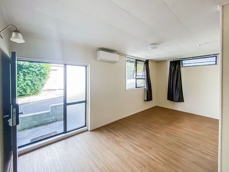 Charming Two-Bedroom Unit with Rumpus Room & Deck - Photo 4