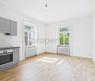 Charmante 3.5-Zimmer-Wohnung in denkmalgeschütztem Gebäude in Büsse... - Foto 4