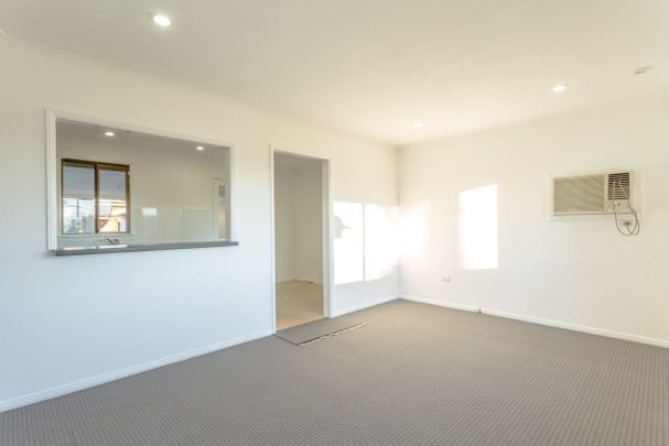 Three bedroom home with large sunroom - Photo 1