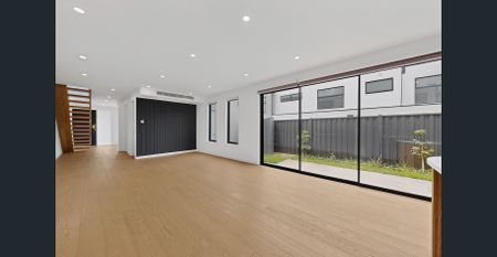 Modern, Spacious & Low-Maintenance Living - Photo 4