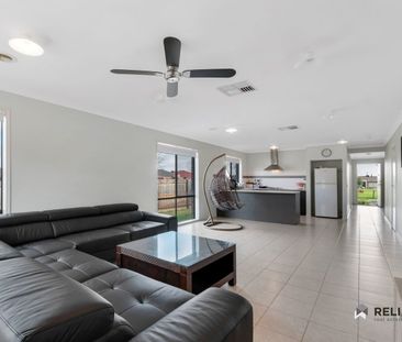 Beautiful Family Home Opposite the Park with a Massive Backyard! - Photo 2