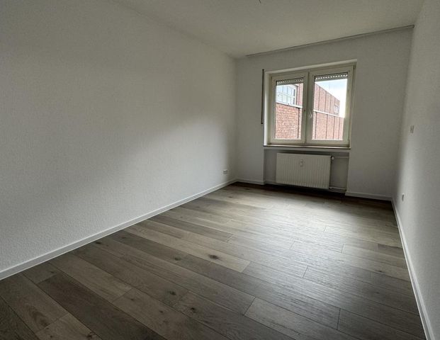 Zentral gelegene Maisonette-Wohnung in der Gütersloher Innenstadt - Photo 1