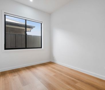 Spacious Modern Home with Designer Features & Low-Maintenance Appeal - Photo 6