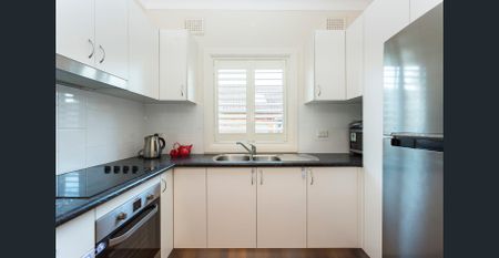 Stylish Two-Bedroom Home with Huge Alfresco Deck & Family-Friendly Yard - Photo 2