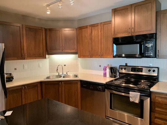 Central Uptown 2 Bed Condo - Photo 1