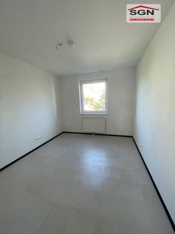 Geförderte Wohnung mit Balkon, Tiefgaragenplatz & Miete-Kaufoption - Photo 3