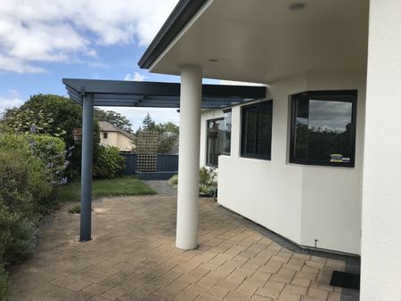 This is a stunning executive home, welcomed through the entrance way to the open dining or family, the large kitchen, with bifold doors that take you through to your own private patio with a stunning view. - Photo 4