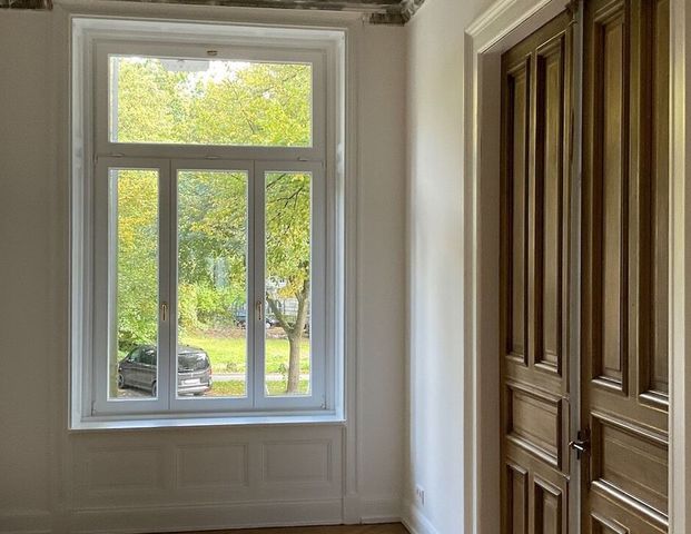Rarität! Traumhafte Wohnung mit Garten inmitten der Stadt! - Foto 1