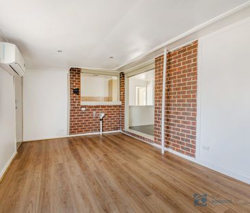 Charming and Conveniently Located 3-Bedroom Home - Photo 2