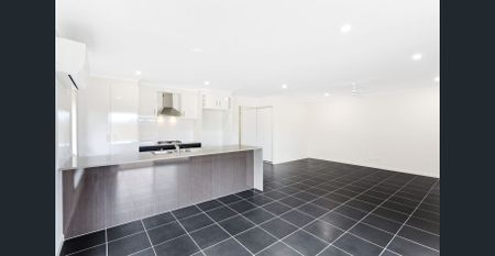 MODERN 4 BEDROOM HOME IN PALLARA - Photo 4