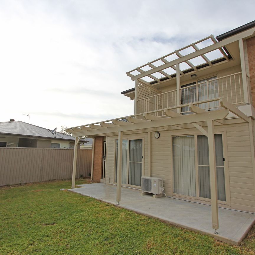 Perfectly Positioned Townhouse - Photo 1