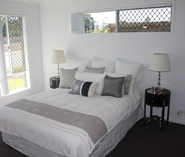 MODERN FOUR BEDROOM HOME IN SOVEREIGN RISE ESTATE!! - Photo 1