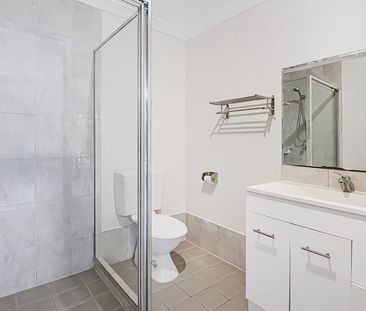 Back Property - Spacious Family Living with Solar, Water Tanks & Mo... - Photo 5