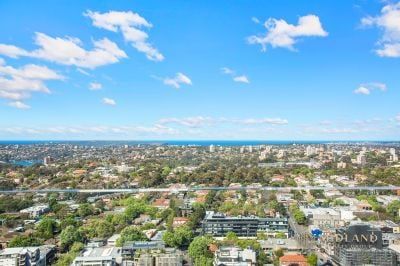 Stunning Two-Bedroom Penthouse with Breathtaking Water Views - Photo 3